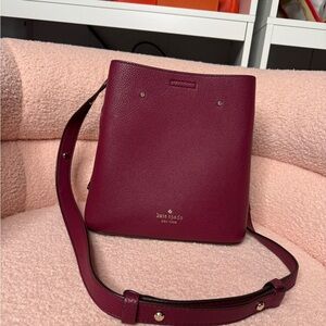 Kate Spade Red Crossbody Bag with Structured Design and Matching Strap